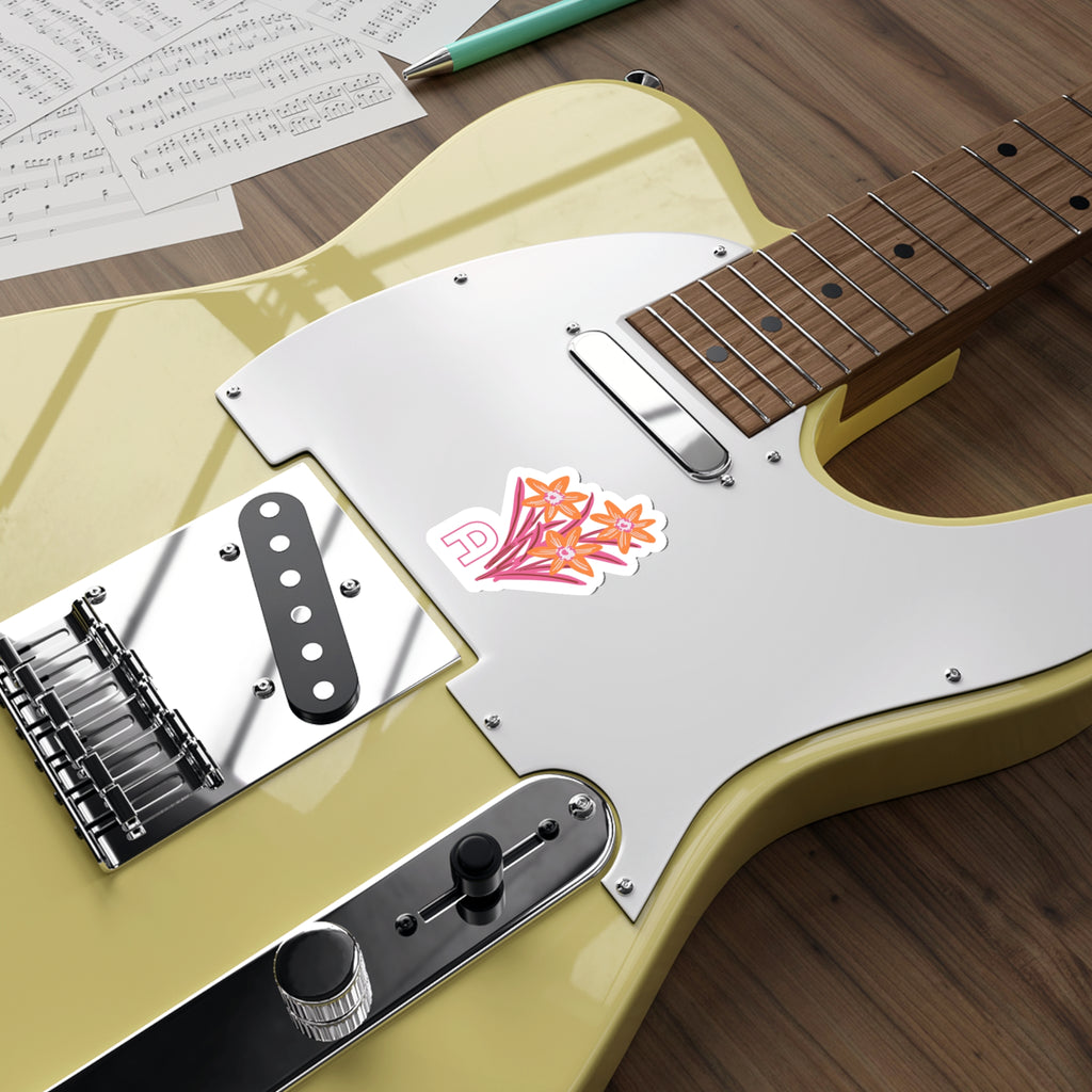 December birthday flower sticker on a guitar
