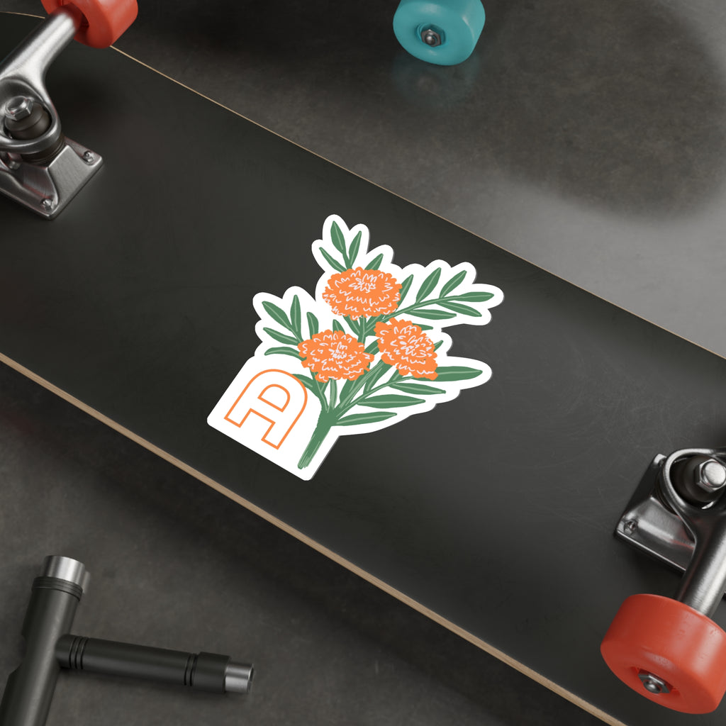 October birthday flower sticker on the underside of a skateboard
