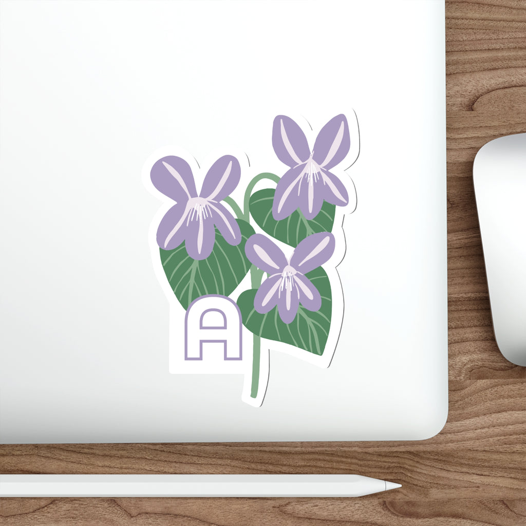 February birthday flower sticker on a laptop