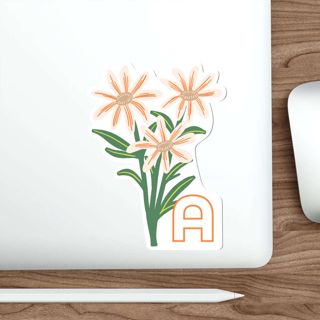April birthday flower sticker on a laptop