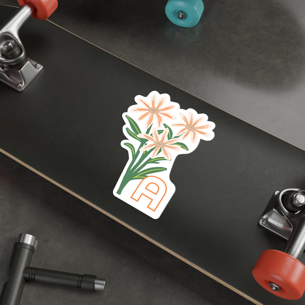 April birthday flower sticker on the underside of a skateboard