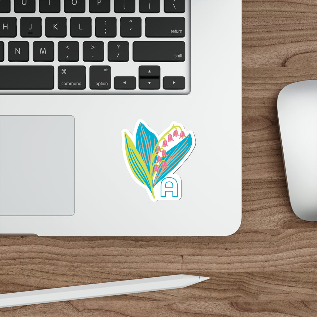May birthday flower sticker on a laptop