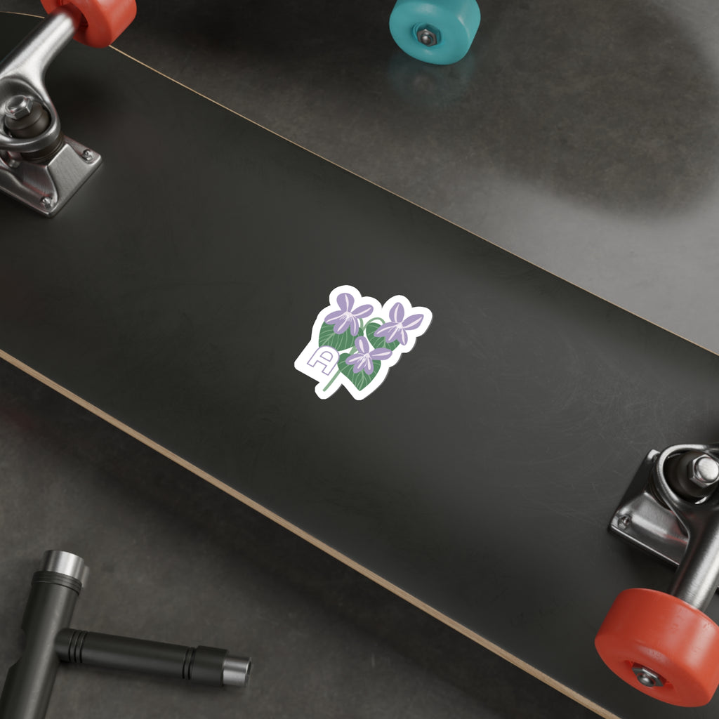 February birthday sticker on the underside of a skateboard