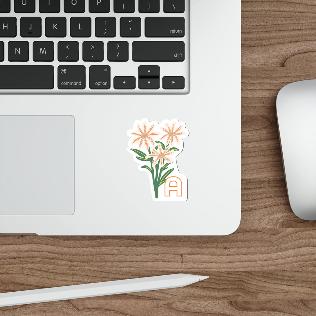 April birthday flower sticker on a laptop