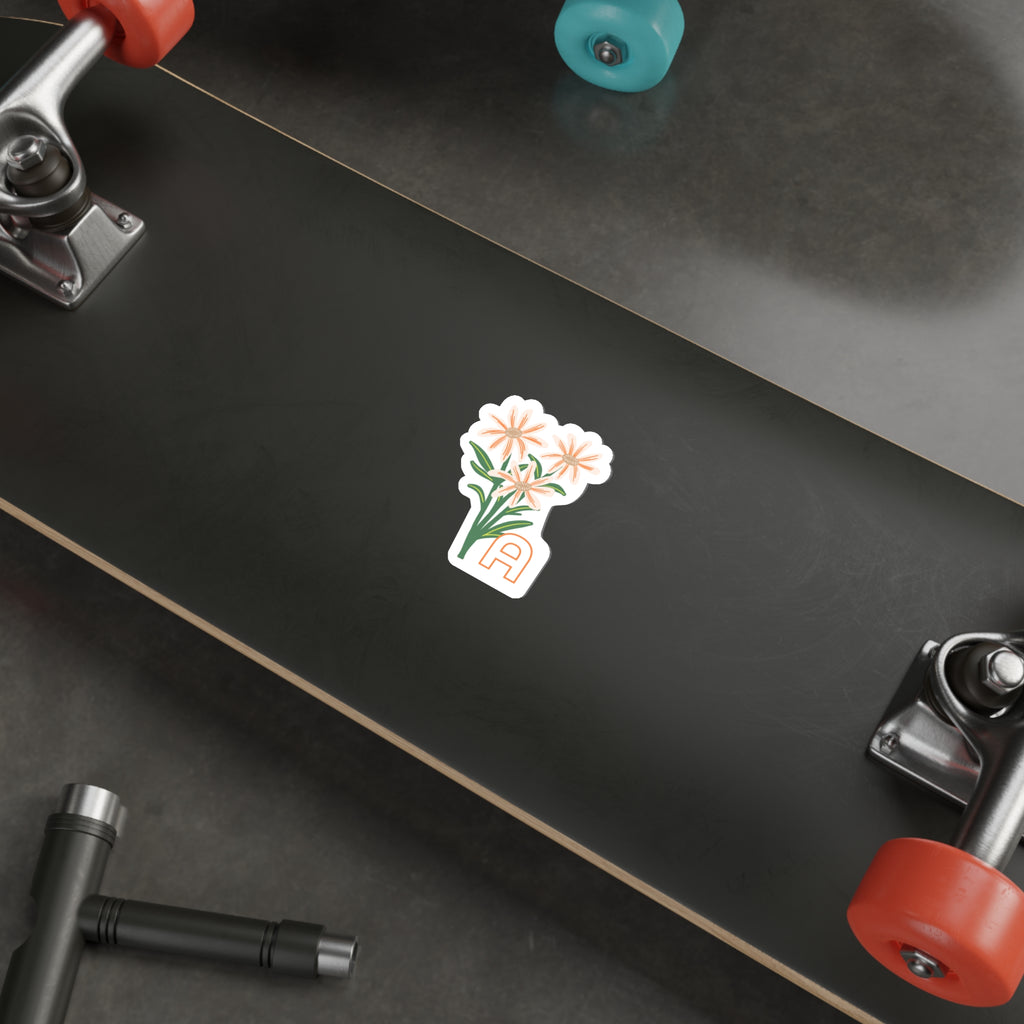 April birthday flower sticker on the underside of a skateboard