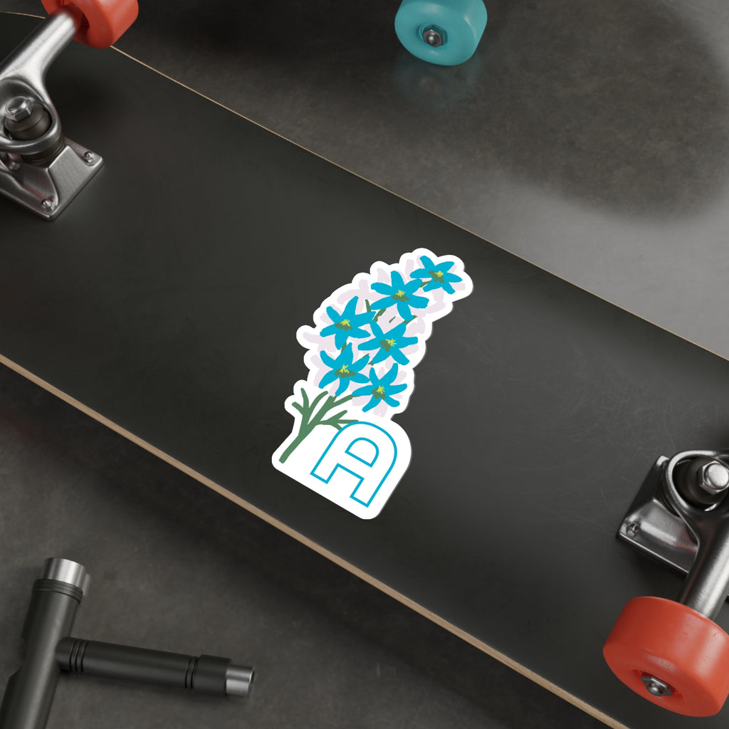 July birthday sticker on the underside of a skateboard