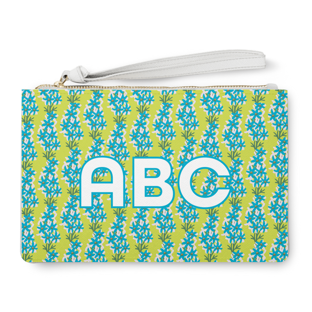 July larkspur birthday flower print on a personalized clutch bag