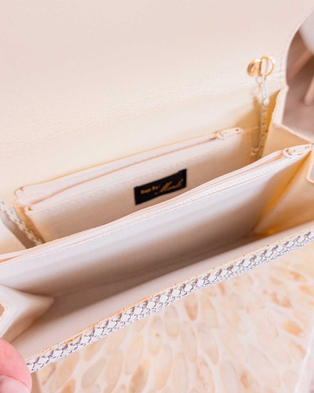 Vintage white chainmail crossbody clutch with gold detail and strap