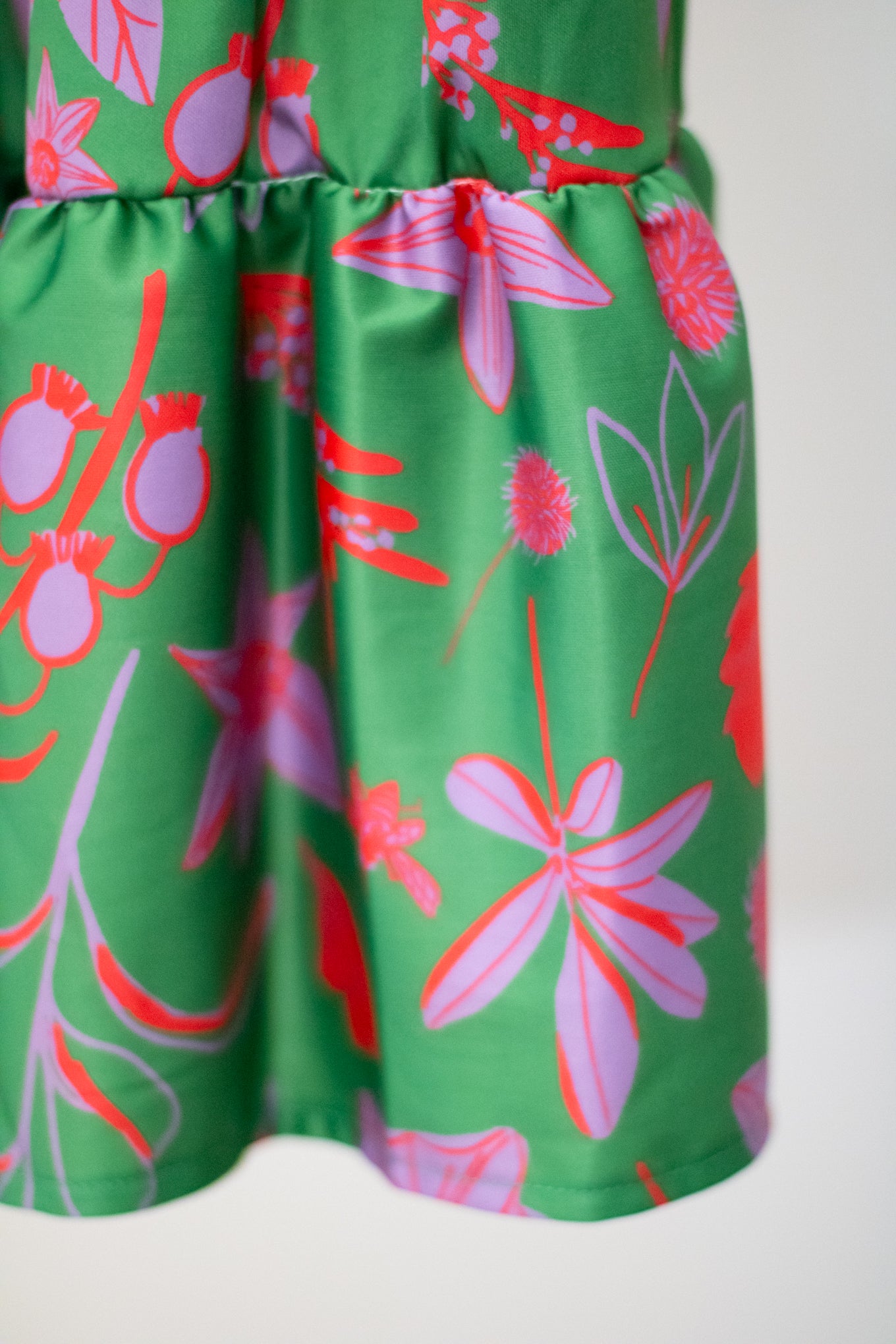 Green and pink floral print dress